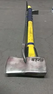 A flathead axe with a yellow handle